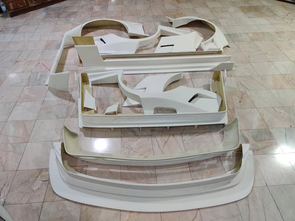 Mercedes-Benz W124 KBD Widebody Kit – Genuine Mercedes-Benz Parts