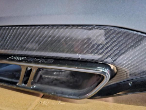 Mercedes E63 AMG Rear Bumper – W213 Sedan – Carbon Diffuser & Exhaust Trims – OEM - Genuine Mercedes-Benz Parts